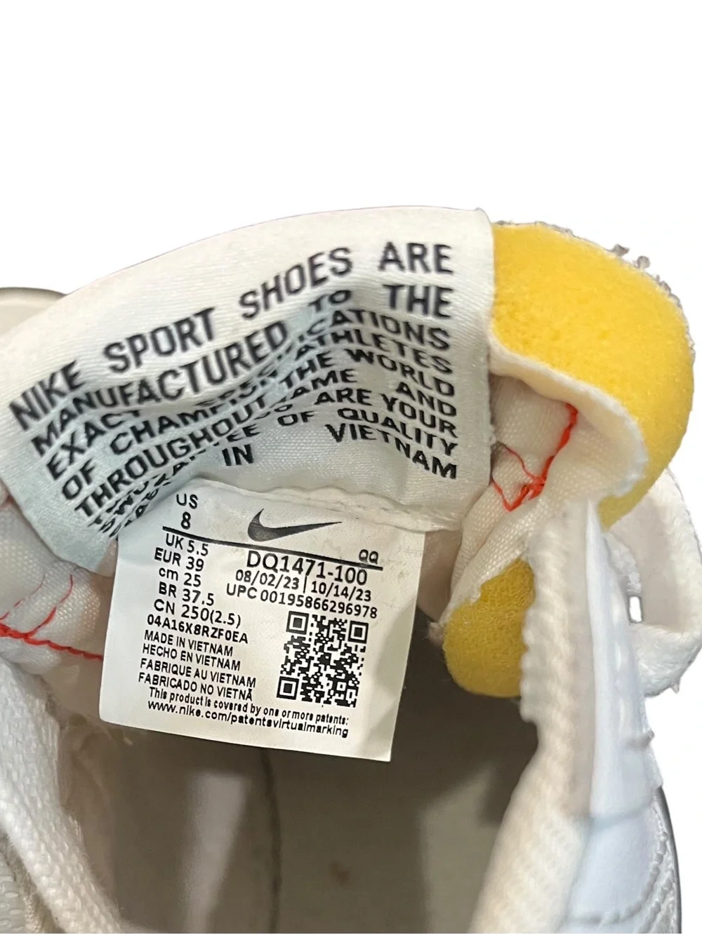 Nike Blazer Mid '77 Jumbo sneakers in a white and orange colorway